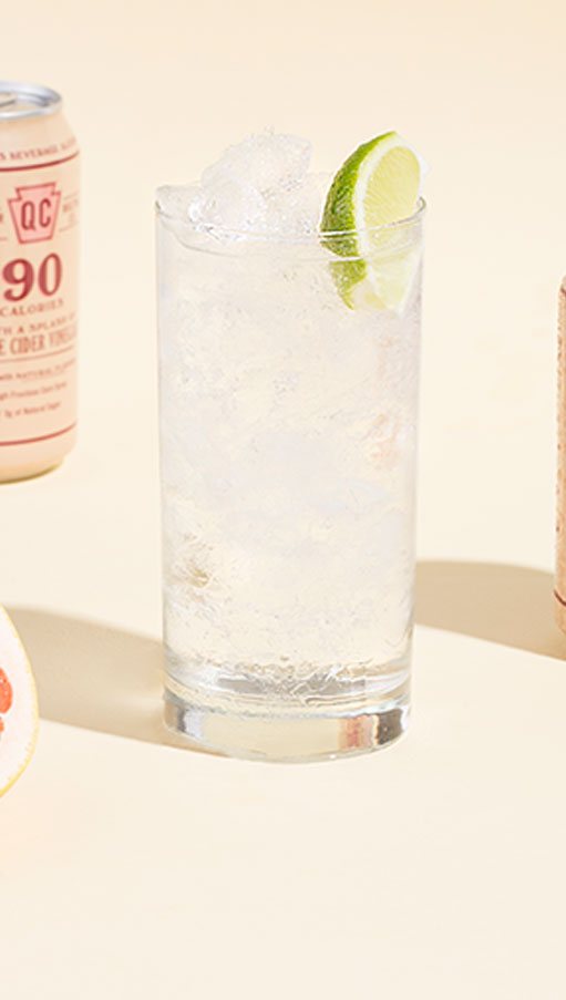 Grapefruit Spritz Cocktail and can of Quaker City Shrubs